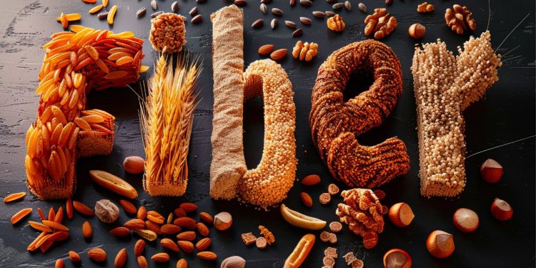 Un'immagine composta da semi e grano con la scritta fiber per indicare i betaglucani