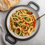 calamari con piselli: ricetta