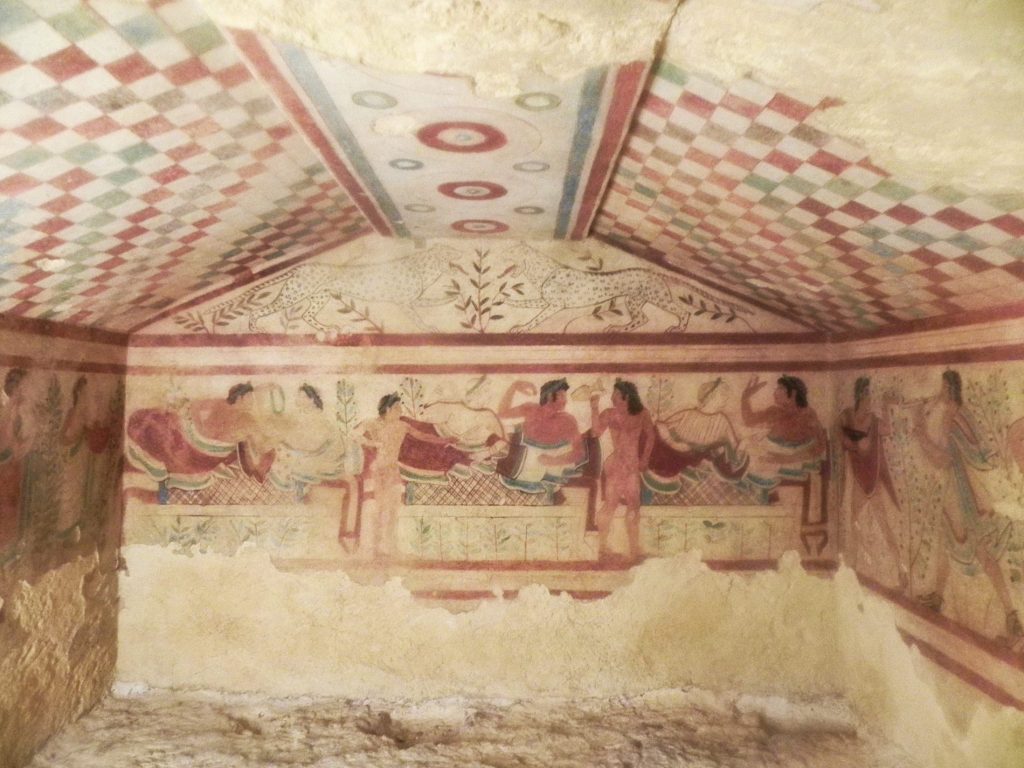 affresco di un banchetto dipinto in una tomba etrusca